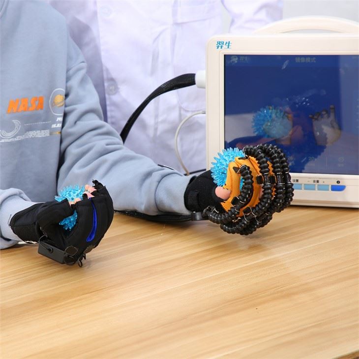 مفلوج کے لیے نرم ہاتھ کا آلہ Exoskeleton